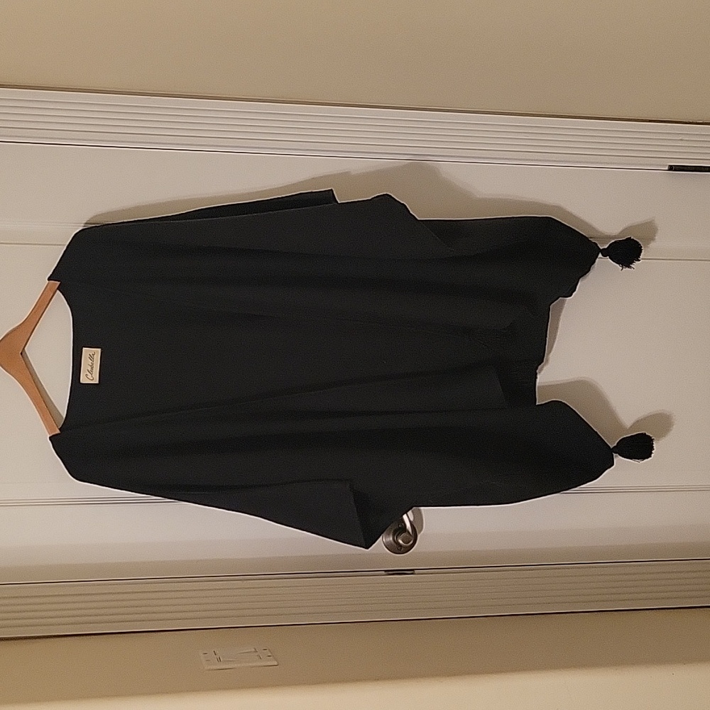 Black Cleobella cape. Very classy. One size fits All